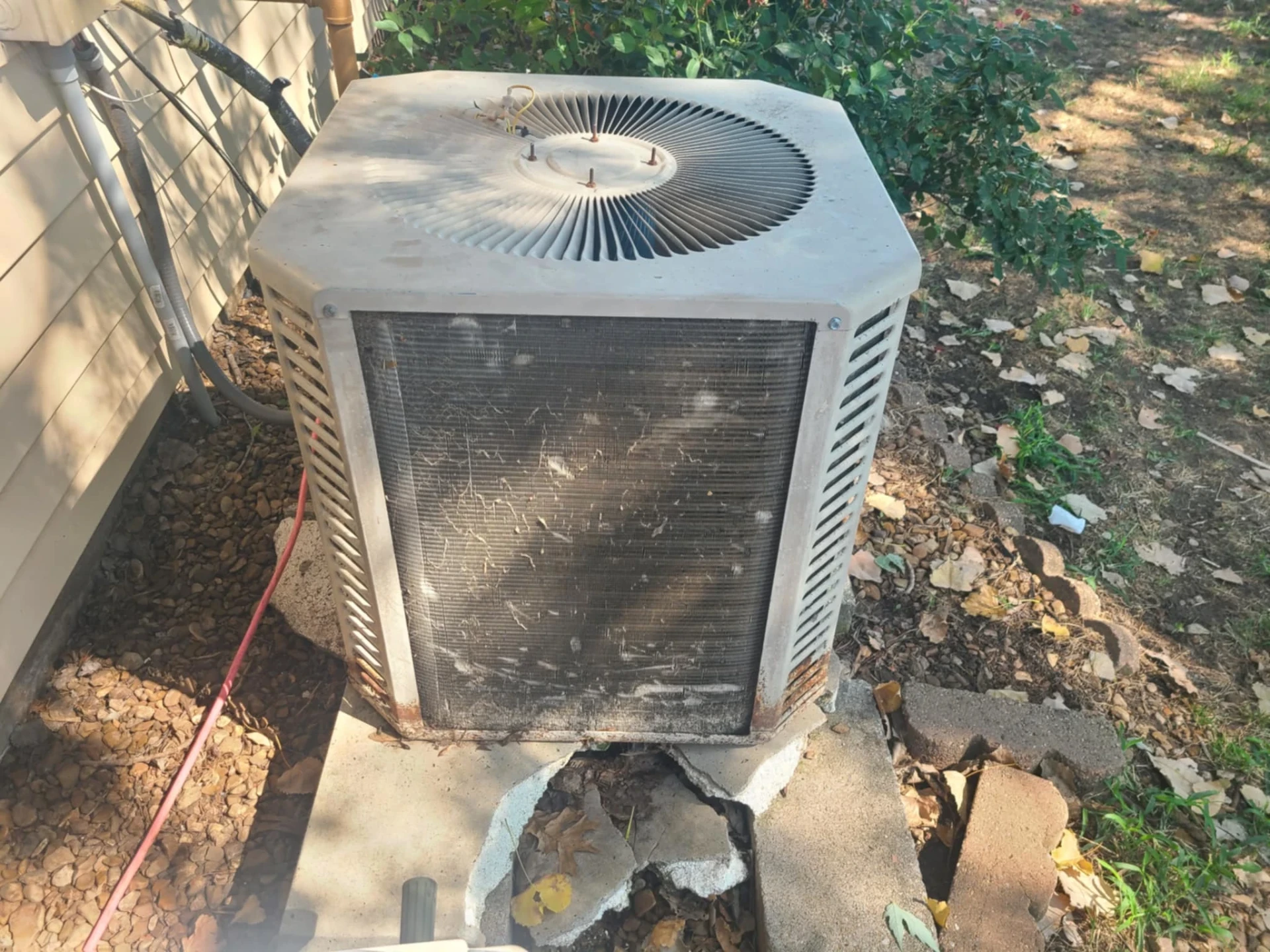 Emergency AC repair near Claremore Oklahoma showing damaged air conditioning unit