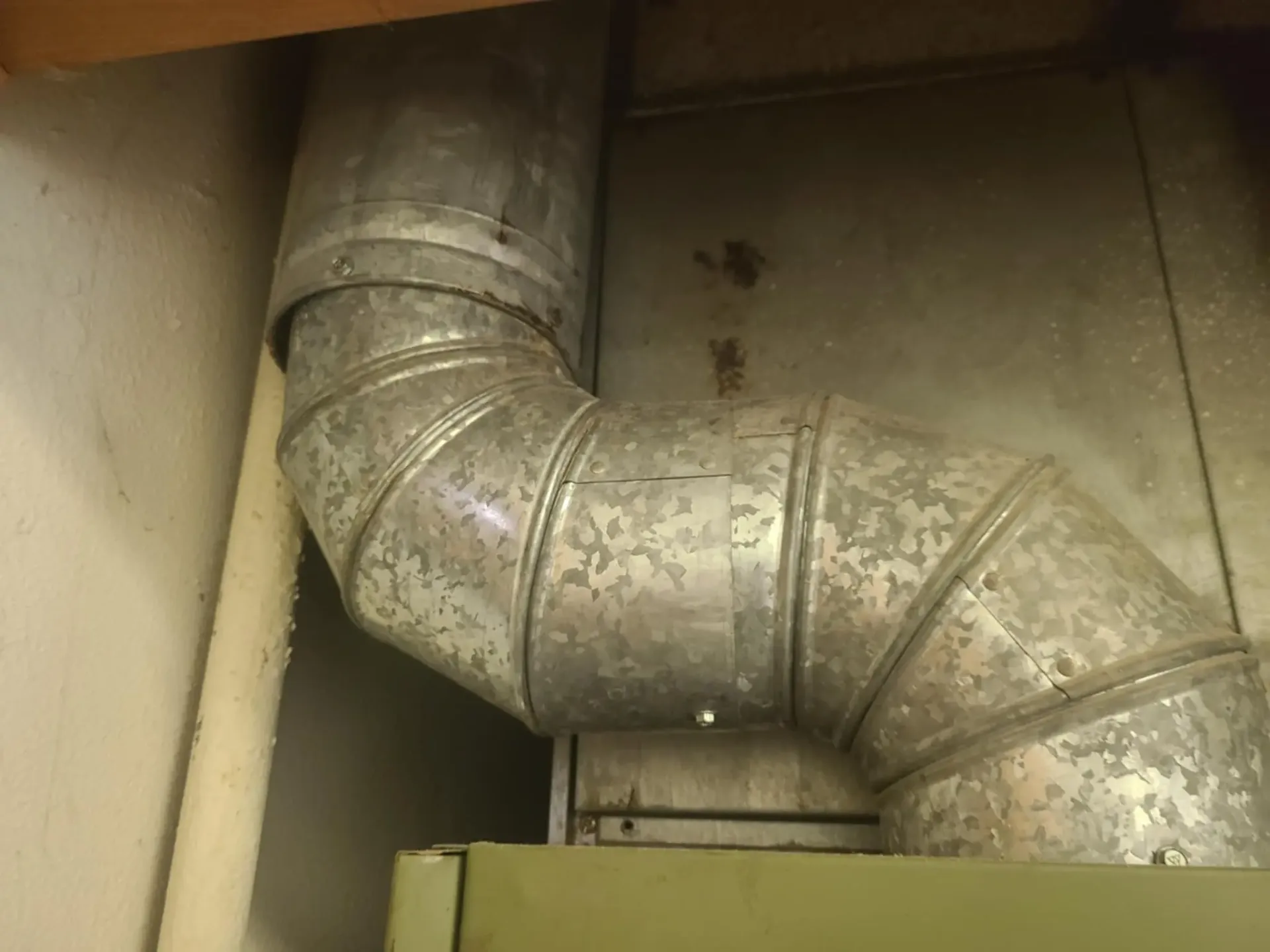 Worn flue pipe requiring furnace repair service in Claremore Oklahoma