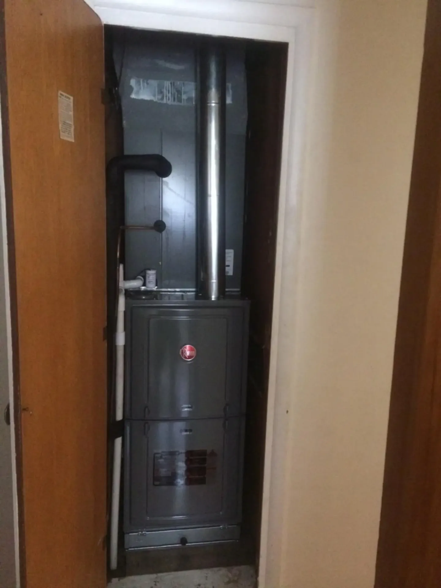 Rheem heating system installation in closet - Claremore Oklahoma HVAC contractor